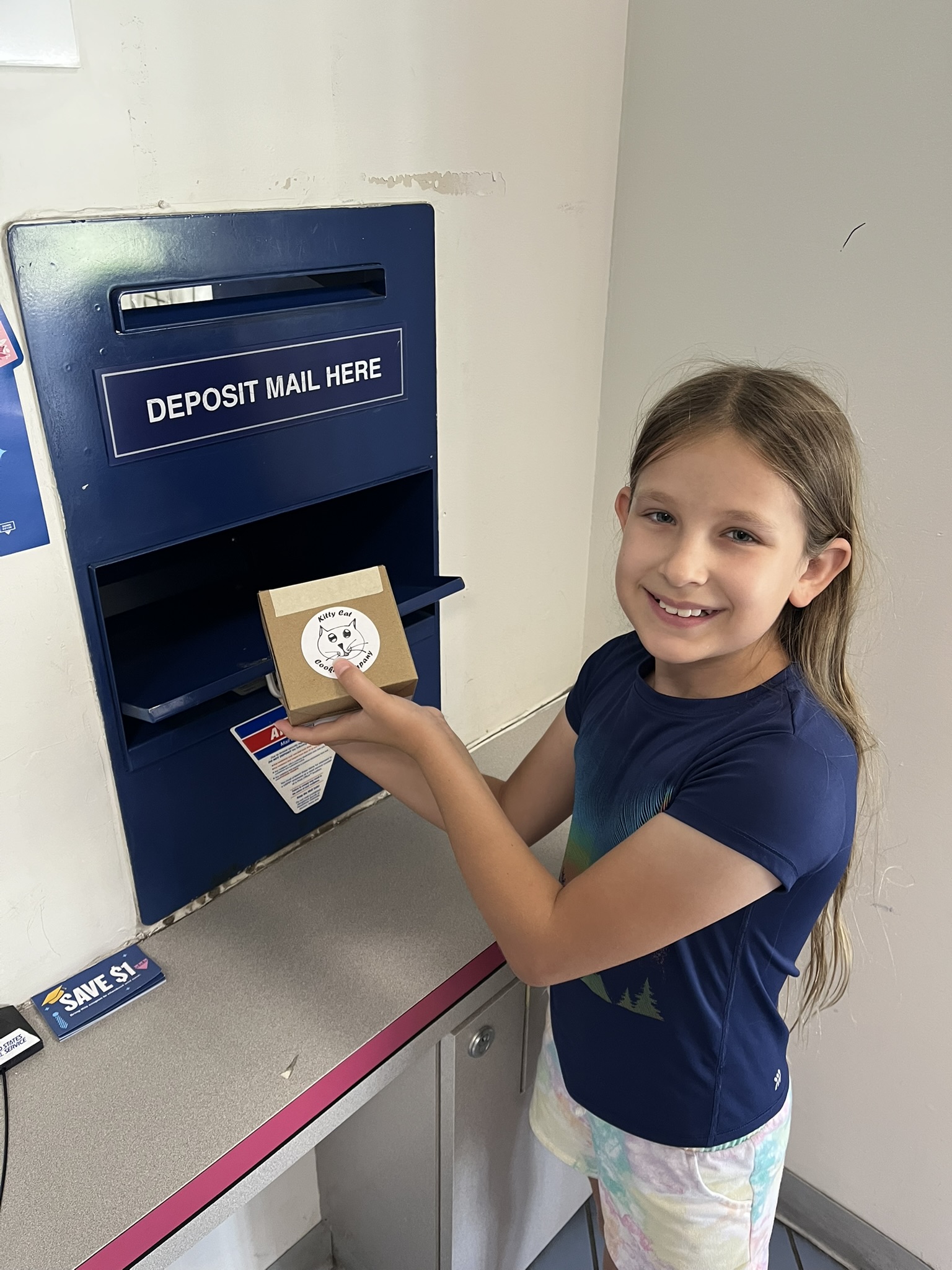 Finley mailing cookies at the post office